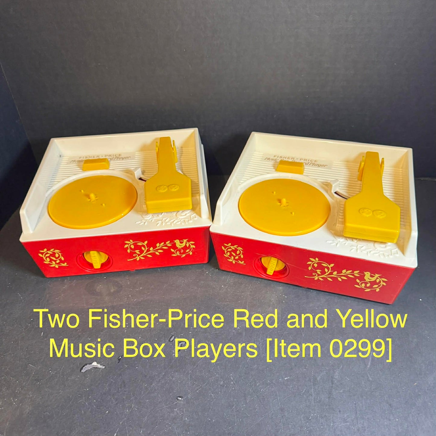 Two Fisher-Price Red and Yellow Music Box Players [Item 0299]