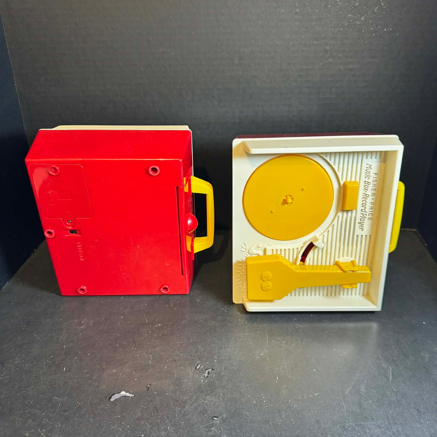 Two Fisher-Price Red and Yellow Music Box Players [Item 0299]